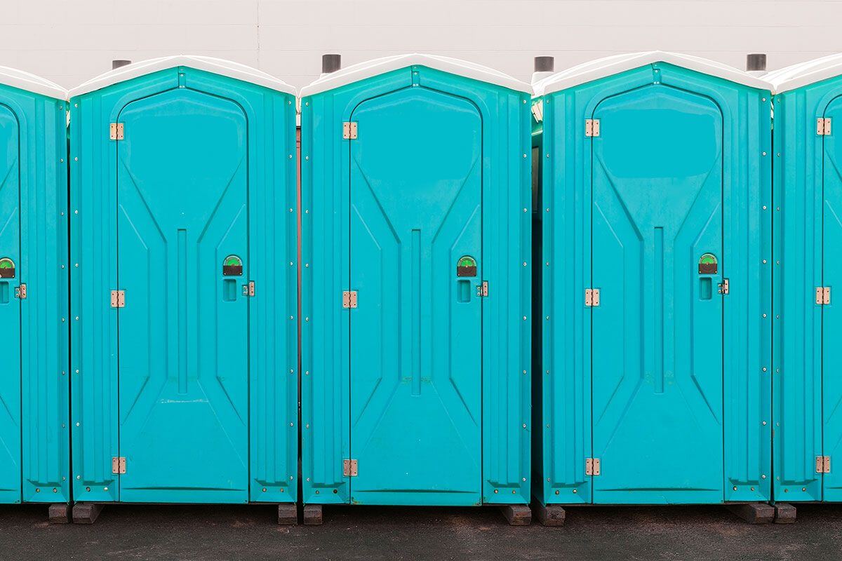Industrial portable restroom units at a plant in Lima, Ohio
